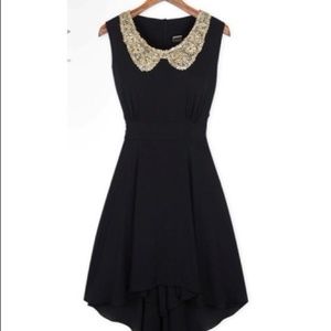 Black dress with golden collar
